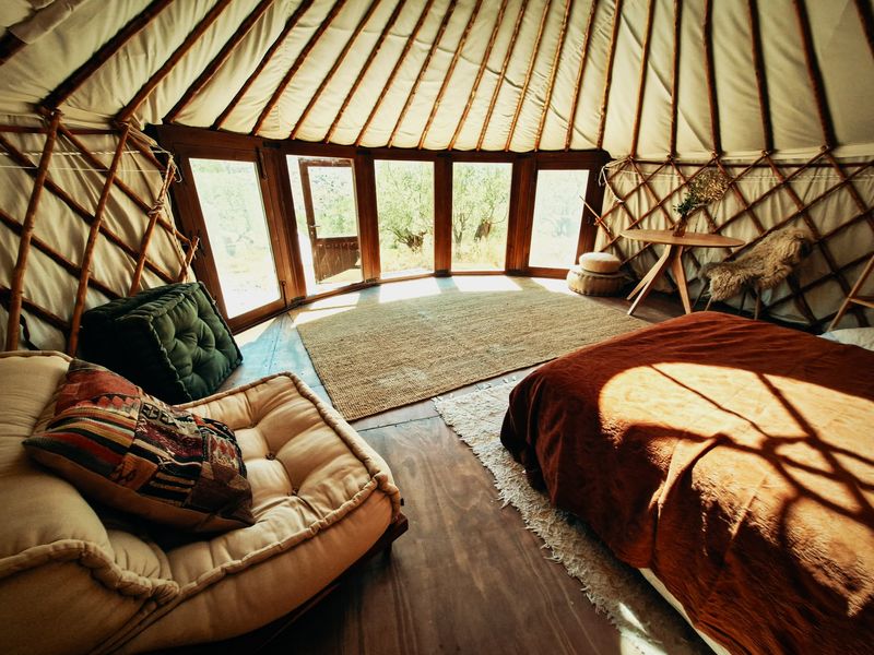 Interior of an insulated Glass Wall yurt with fitted doors and windows