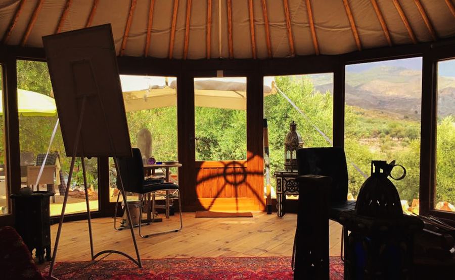 Interior of a Glass Wall Yurt Workshop yurt with wide views across the landscape